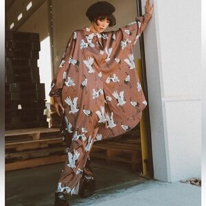 Dressed in lala satin playsuit in size L/XL brand new with tags Sold out online